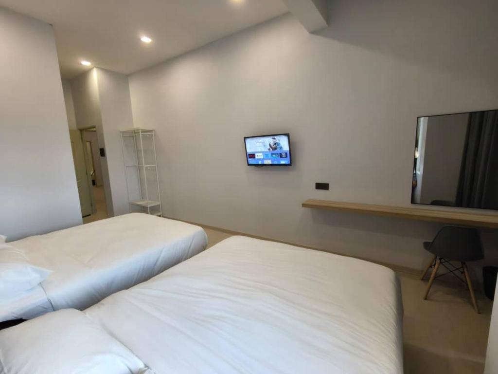 Postel nebo postele na pokoji v ubytování Room 2 U Hostel & Guest House