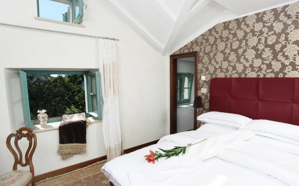 Posteľ alebo postele v izbe v ubytovaní Boutique Hotel Vela Vrata