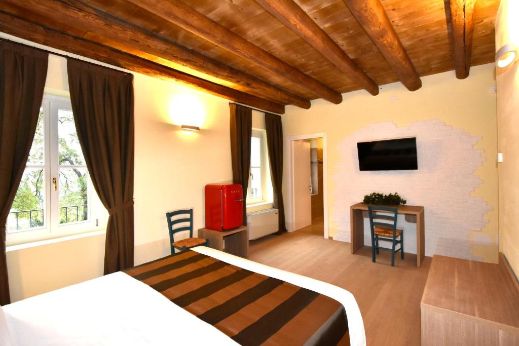 Postel nebo postele na pokoji v ubytování Le Palazzole