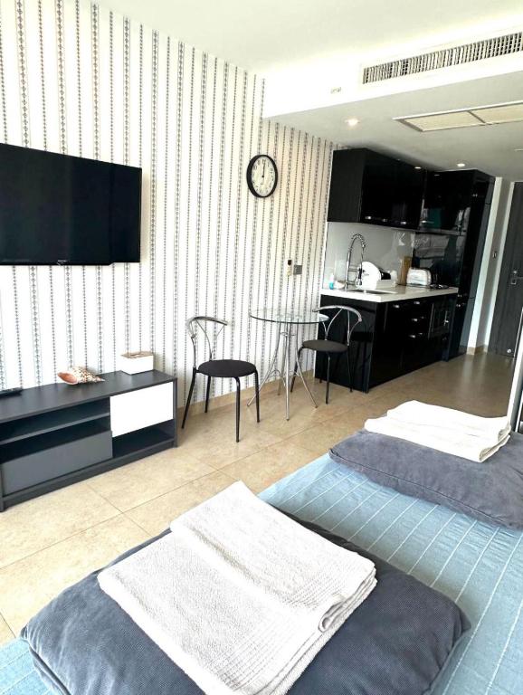 TV a/nebo společenská místnost v ubytování Centara Pattaya Apartment