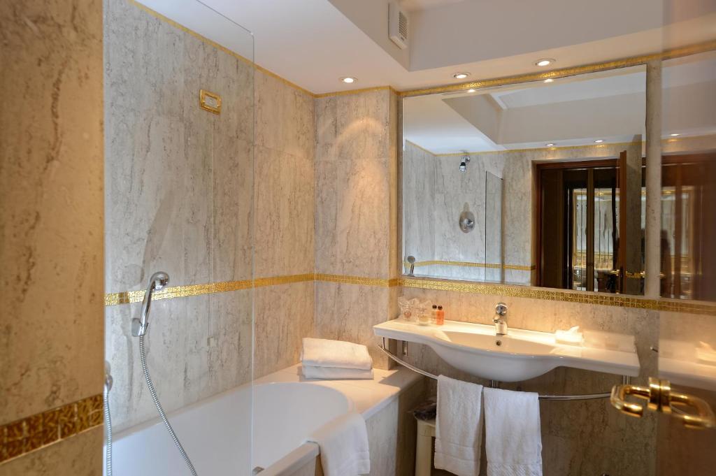 Koupelna v ubytování Hotel Concordia