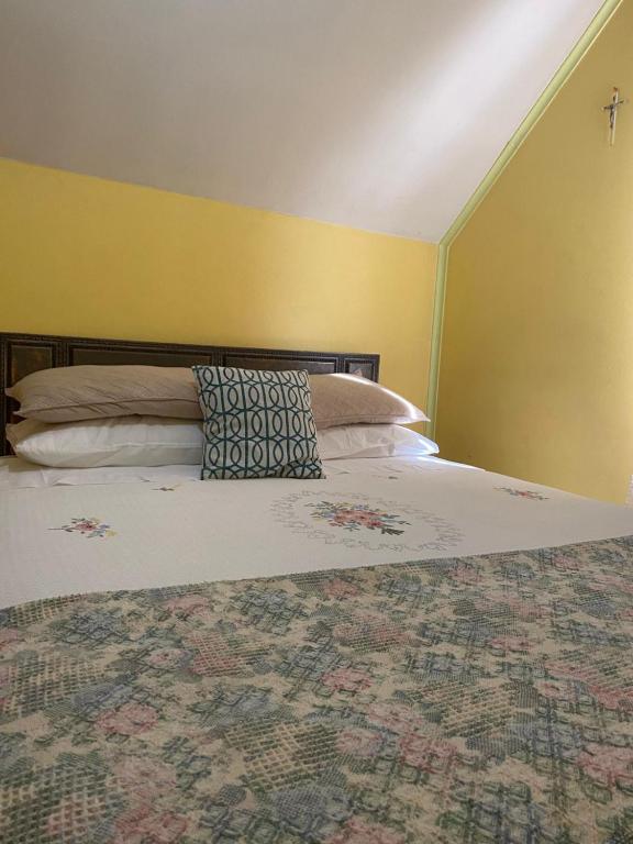 Postel nebo postele na pokoji v ubytování Hospedaje BoppHouse