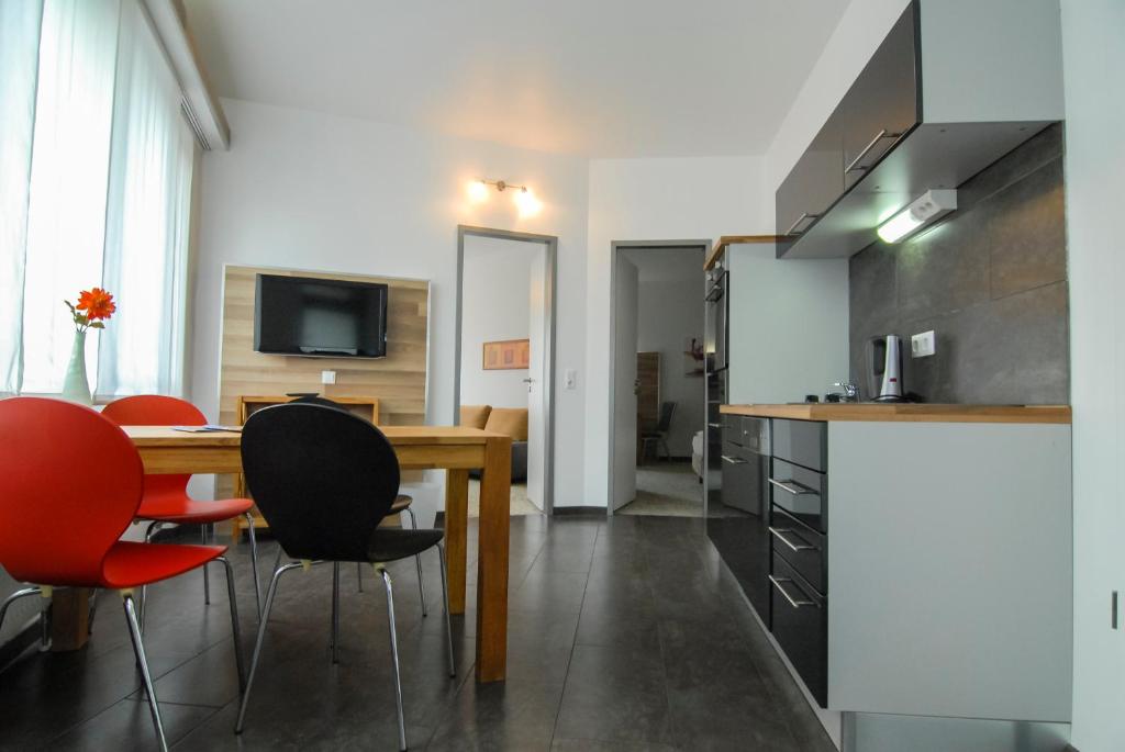 Kuchyň nebo kuchyňský kout v ubytování Petul Apart Hotel Am Ruhrbogen