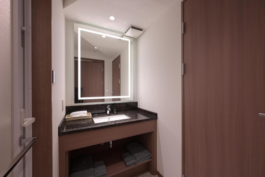 Koupelna v ubytování COCOYO Hotel 大塚