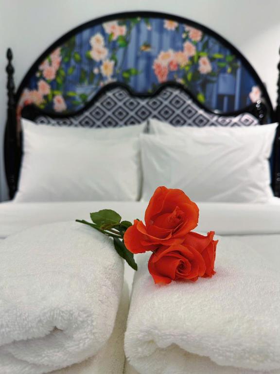 Postel nebo postele na pokoji v ubytování Hoang Gia Hotel Cau Giay
