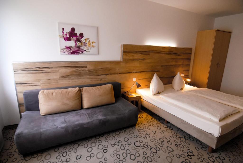 Postel nebo postele na pokoji v ubytování Petul Apart Hotel Am Ruhrbogen