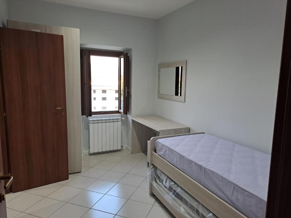 Ένα ή περισσότερα κρεβάτια σε δωμάτιο στο Agriturismo Tenuta Pavoni