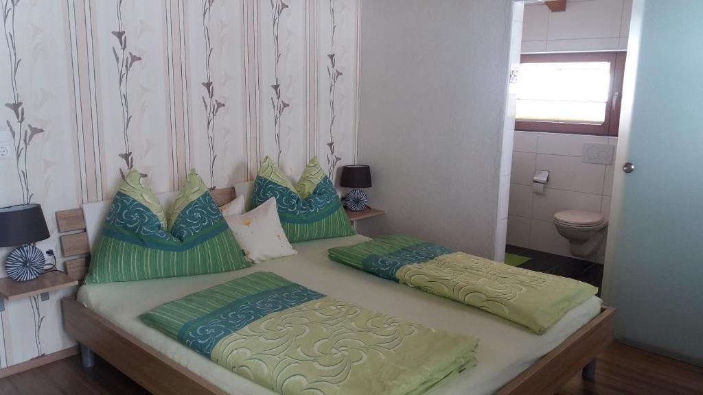 Postel nebo postele na pokoji v ubytování Haus Hildegard