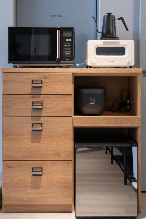 Kuchyň nebo kuchyňský kout v ubytování UNPLAN Residence suite