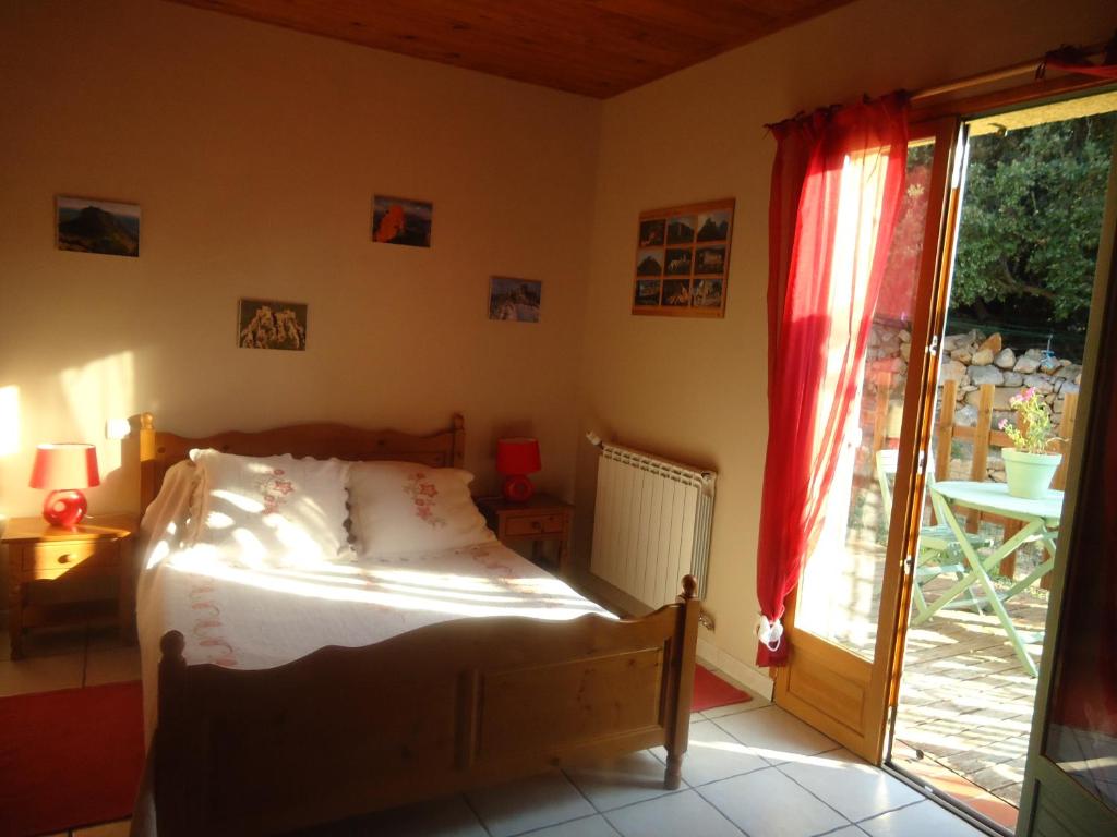 Postel nebo postele na pokoji v ubytování La Claouzo