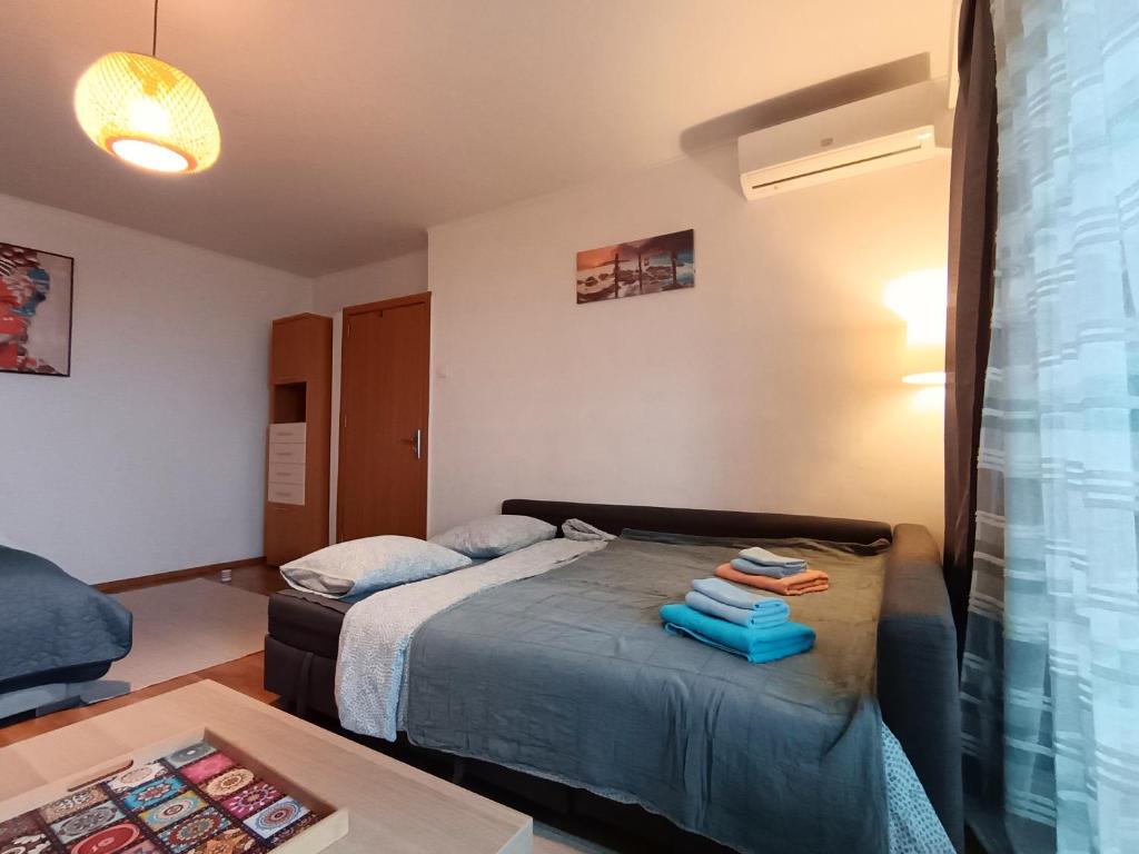 Postel nebo postele na pokoji v ubytování Sunrise Beachfront Relax Residence