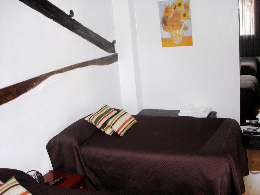 Postel nebo postele na pokoji v ubytování La Casita Camponaraya