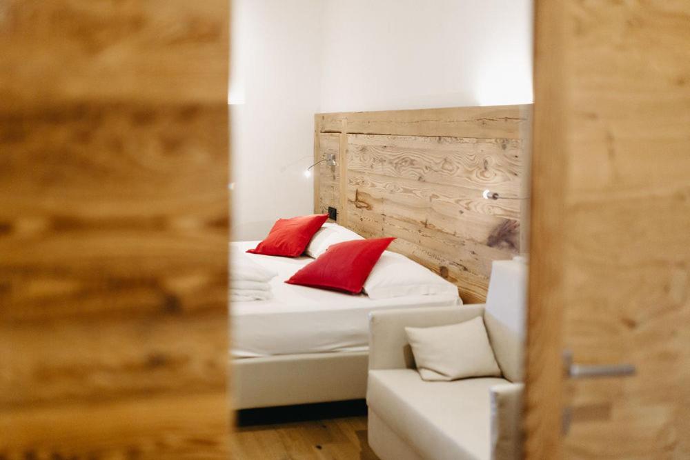 Postel nebo postele na pokoji v ubytování Hotel Aurai