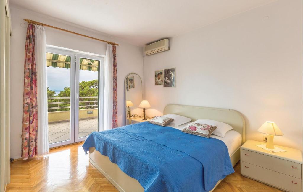 Posteľ alebo postele v izbe v ubytovaní Apartment Makarska With Sea View 5