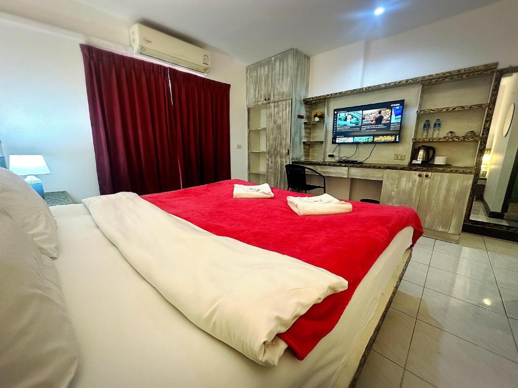Postel nebo postele na pokoji v ubytování The Shades Hotel 50 meter Beach Front