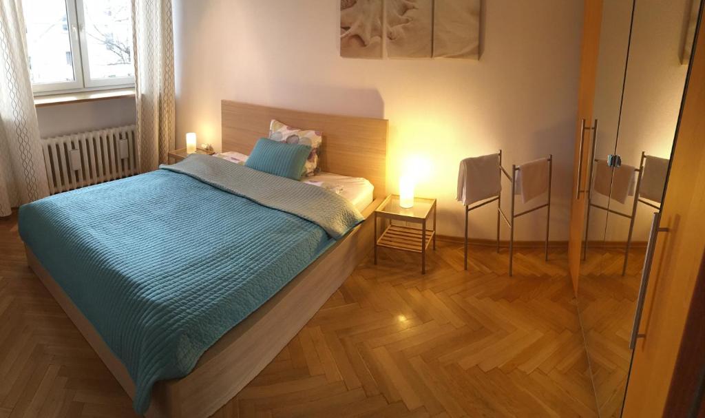 Posteľ alebo postele v izbe v ubytovaní Wilson Apartment
