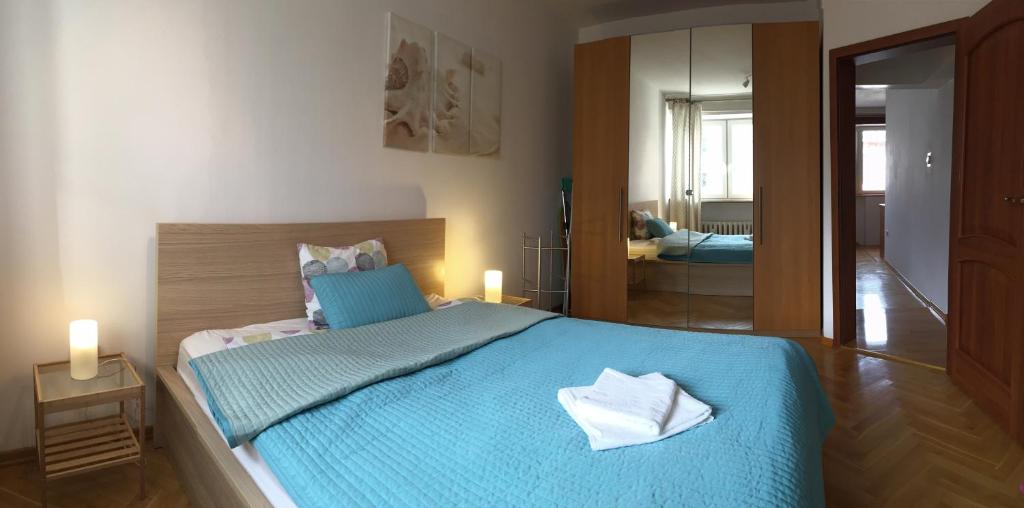 Posteľ alebo postele v izbe v ubytovaní Wilson Apartment