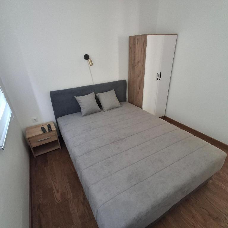 Postel nebo postele na pokoji v ubytování APARTMAN studio DADO