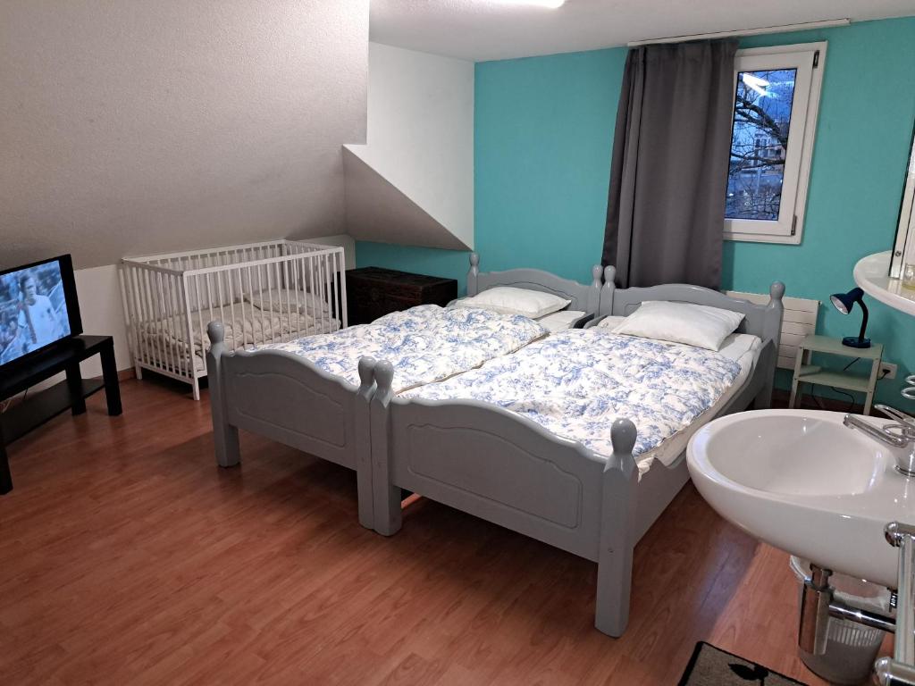 Postel nebo postele na pokoji v ubytování Bellpark Hostel