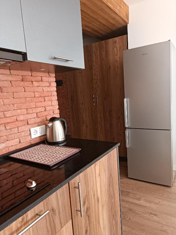 Kuchyň nebo kuchyňský kout v ubytování Apartment with a great view 544