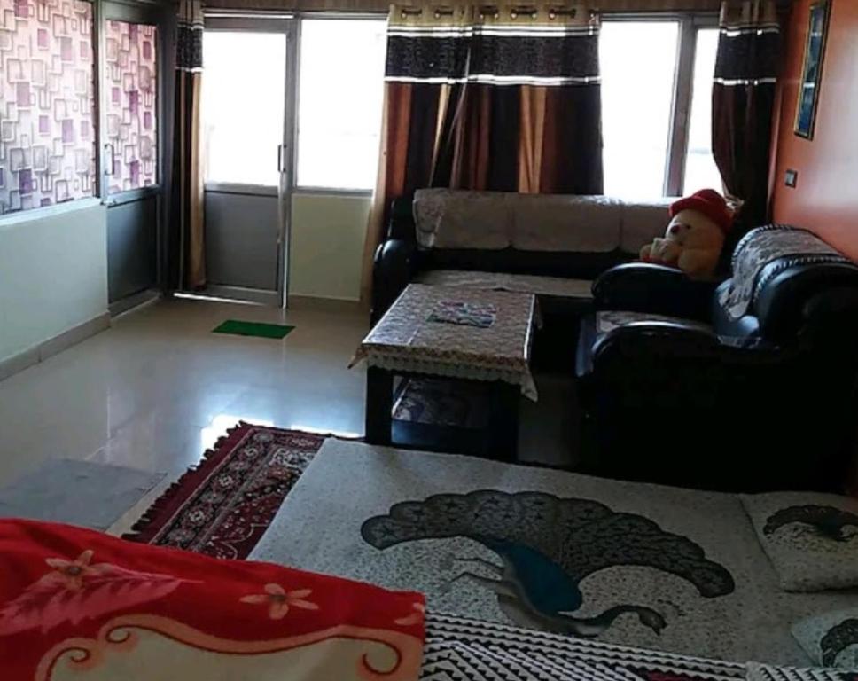 Posezení v ubytování Aashiyana Studio Homestay