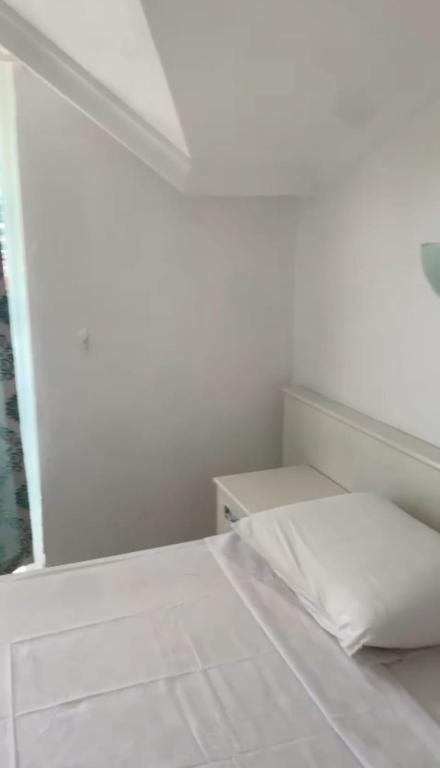 Postel nebo postele na pokoji v ubytování Sen Apart