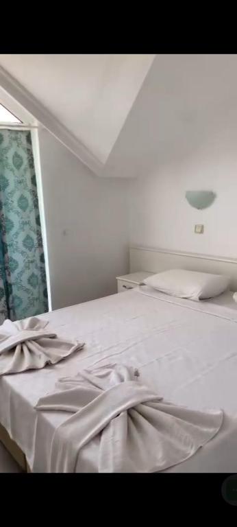 Postel nebo postele na pokoji v ubytování Sen Apart