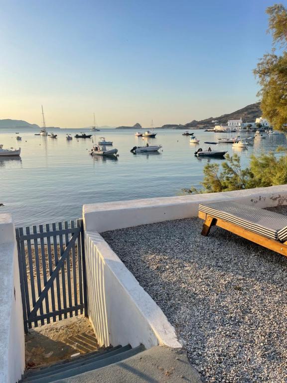 a view of a harbor with boats in the water at Ahinos in Pollonia
