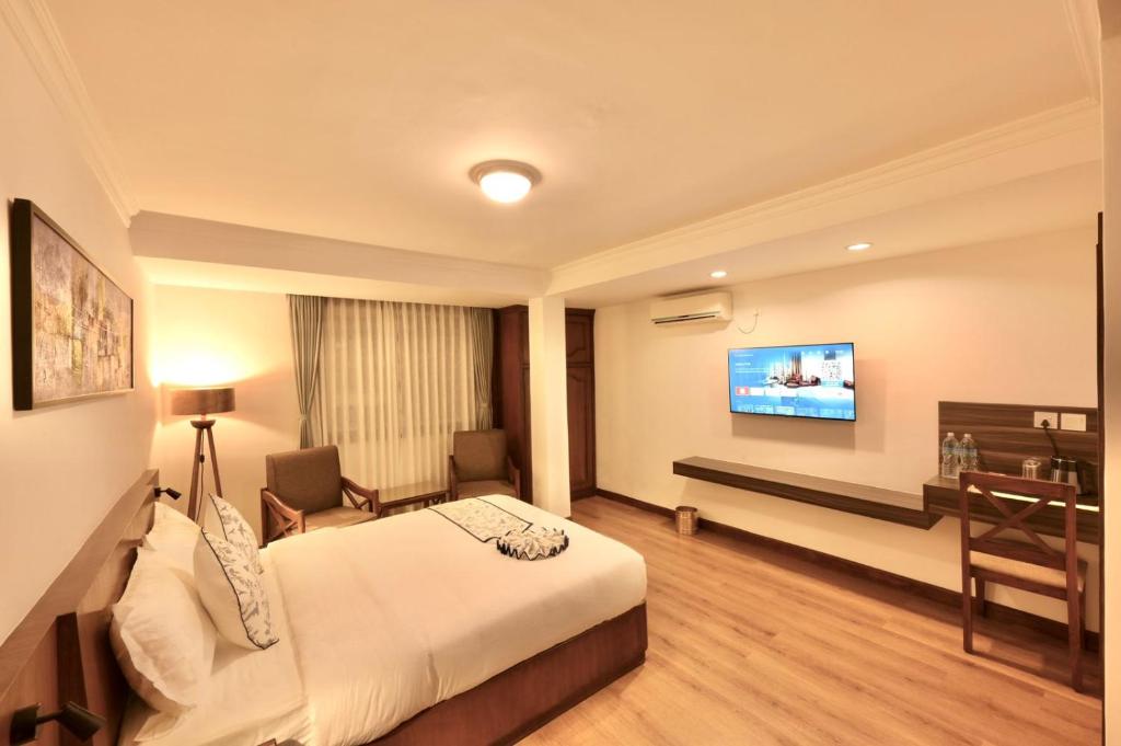 TV a/nebo společenská místnost v ubytování Gallery Park Hotel