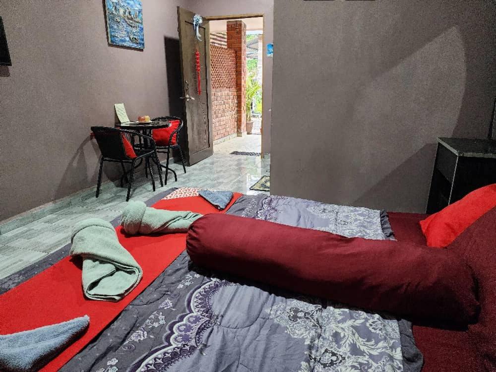 Postel nebo postele na pokoji v ubytování Inspire Rooms Langkawi