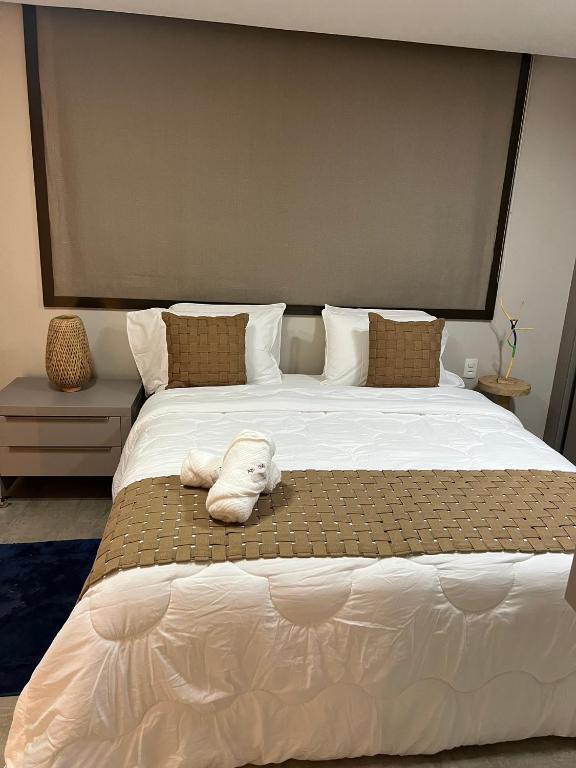Barra Bali Ap 06 - Paraíso à Beira Marにあるベッド