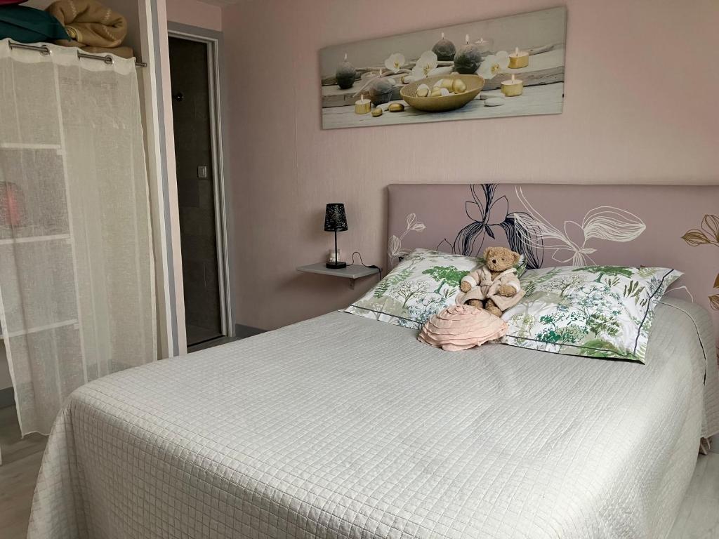 Postel nebo postele na pokoji v ubytování Ty Annick