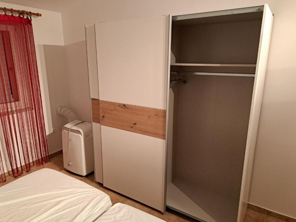 Posteľ alebo postele v izbe v ubytovaní Apartman GRL