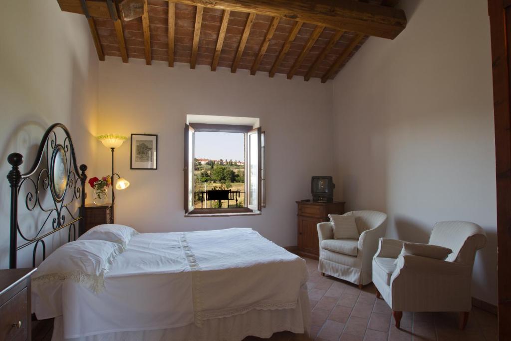 Postel nebo postele na pokoji v ubytování Agriturismo La Collina