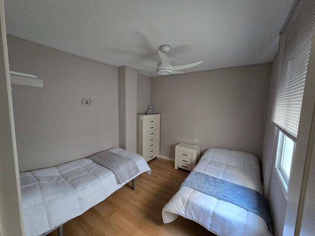 Postel nebo postele na pokoji v ubytování Plaza Apartment Parking Free