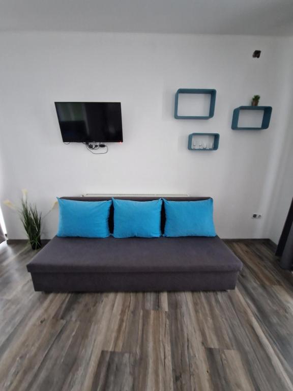 TV a/nebo společenská místnost v ubytování Elix stúdio