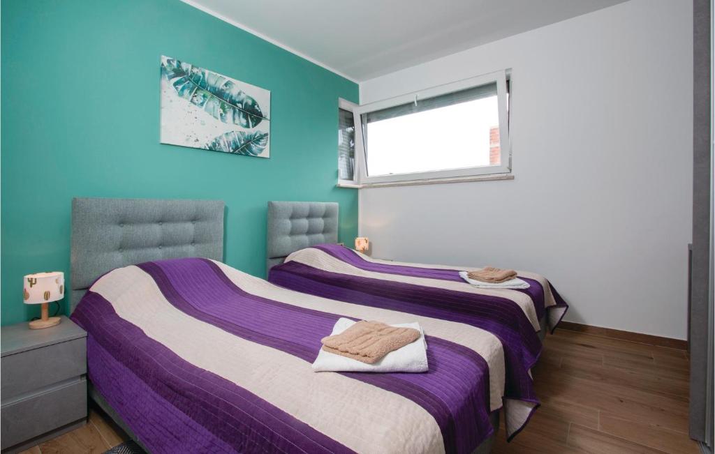 Fotografie z fotogalerie ubytování Two-Bedroom Holiday Home In Peroj v destinaci Peroj