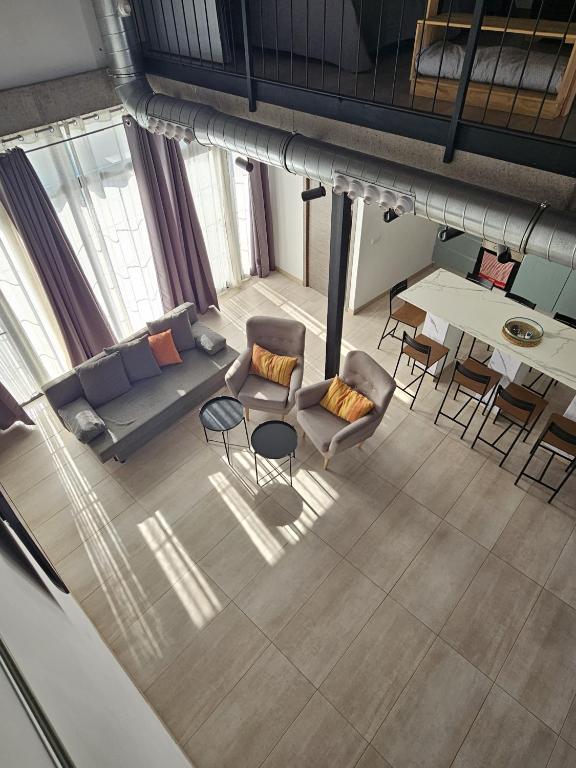 Posezení v ubytování Alojamiento El Pez Casa con piscina climatizada