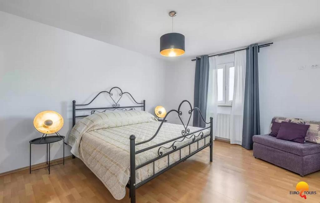 Postel nebo postele na pokoji v ubytování Villa Grguci