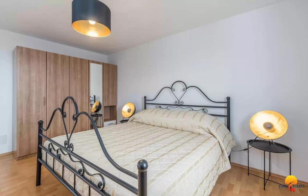 Postel nebo postele na pokoji v ubytování Villa Grguci