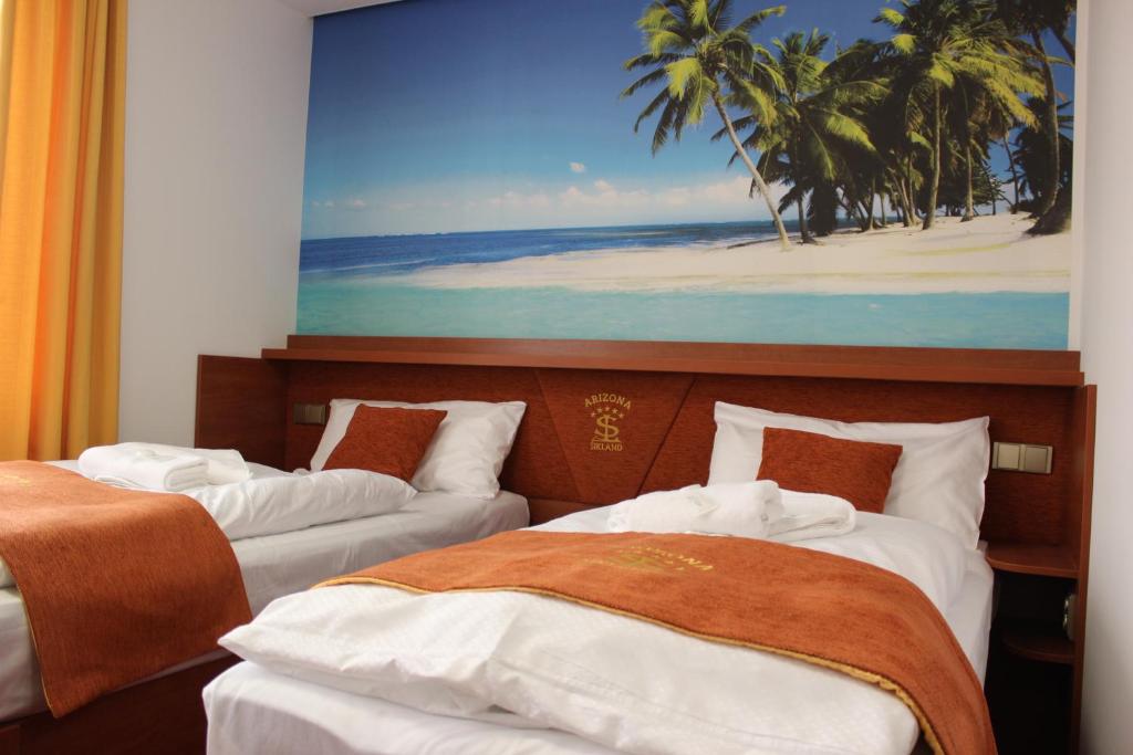 Postel nebo postele na pokoji v ubytování Hotelový resort Šikland