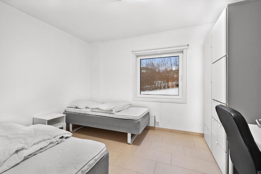 Postel nebo postele na pokoji v ubytování Namsos Hybelhus