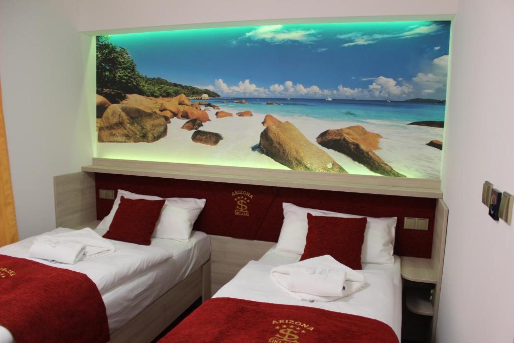 Postel nebo postele na pokoji v ubytování Hotelový resort Šikland