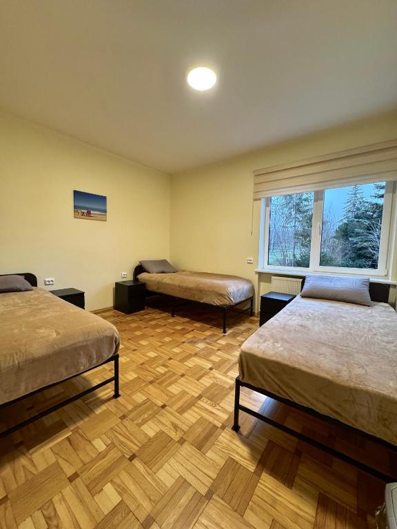 Postel nebo postele na pokoji v ubytování Park Hostel