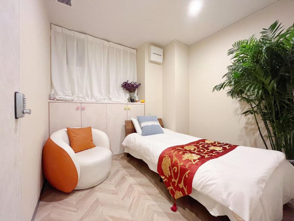 Postel nebo postele na pokoji v ubytování MIYAVI hotel