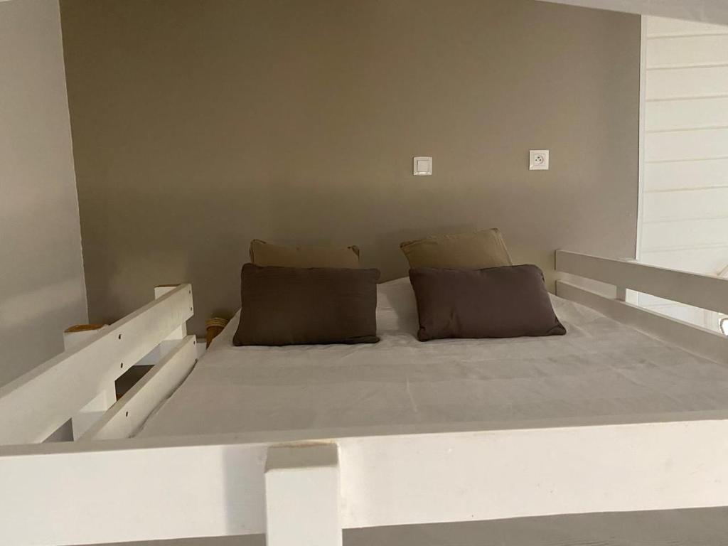 Postel nebo postele na pokoji v ubytování Bwa K'nel