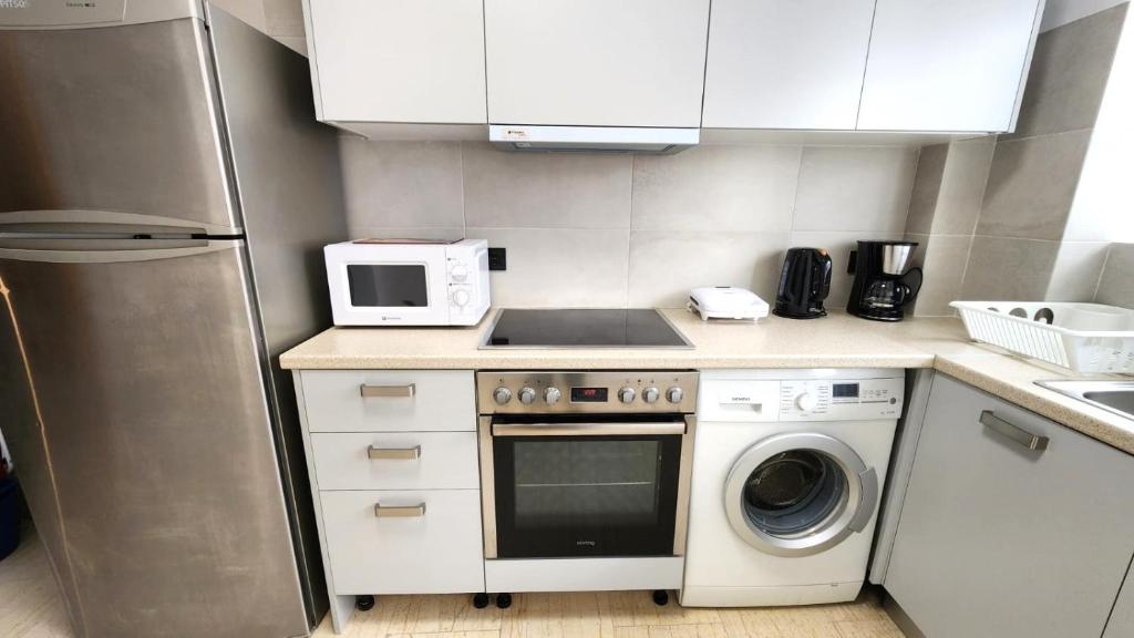 Kuchyň nebo kuchyňský kout v ubytování Grec Maison Piraeus by GrecCollection