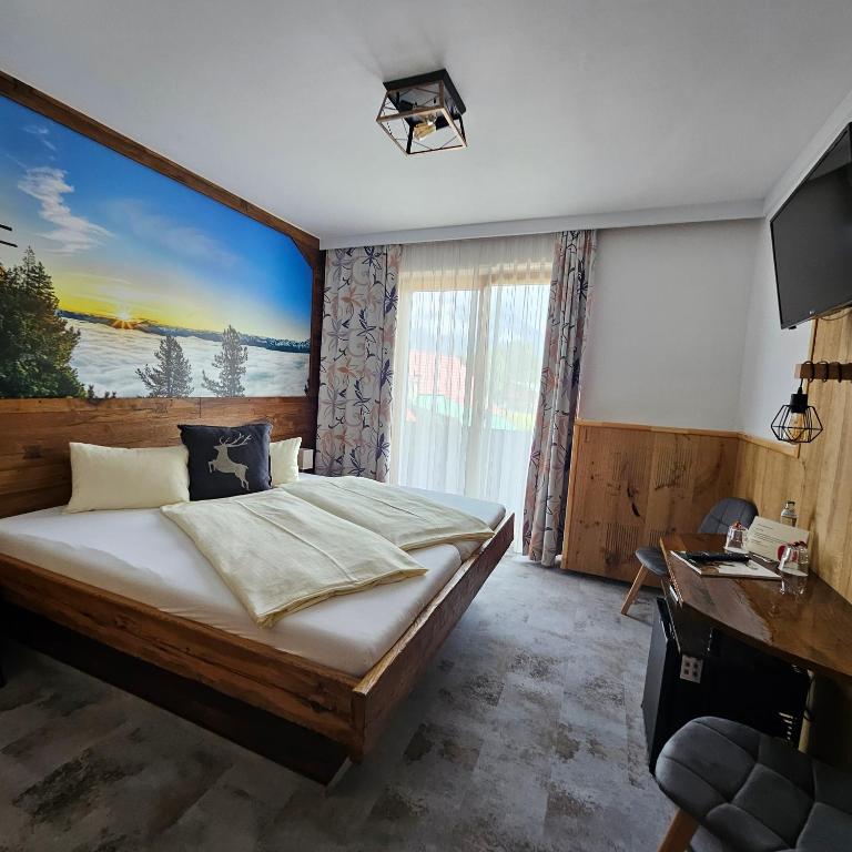 Postel nebo postele na pokoji v ubytování Berghof Mitterberg