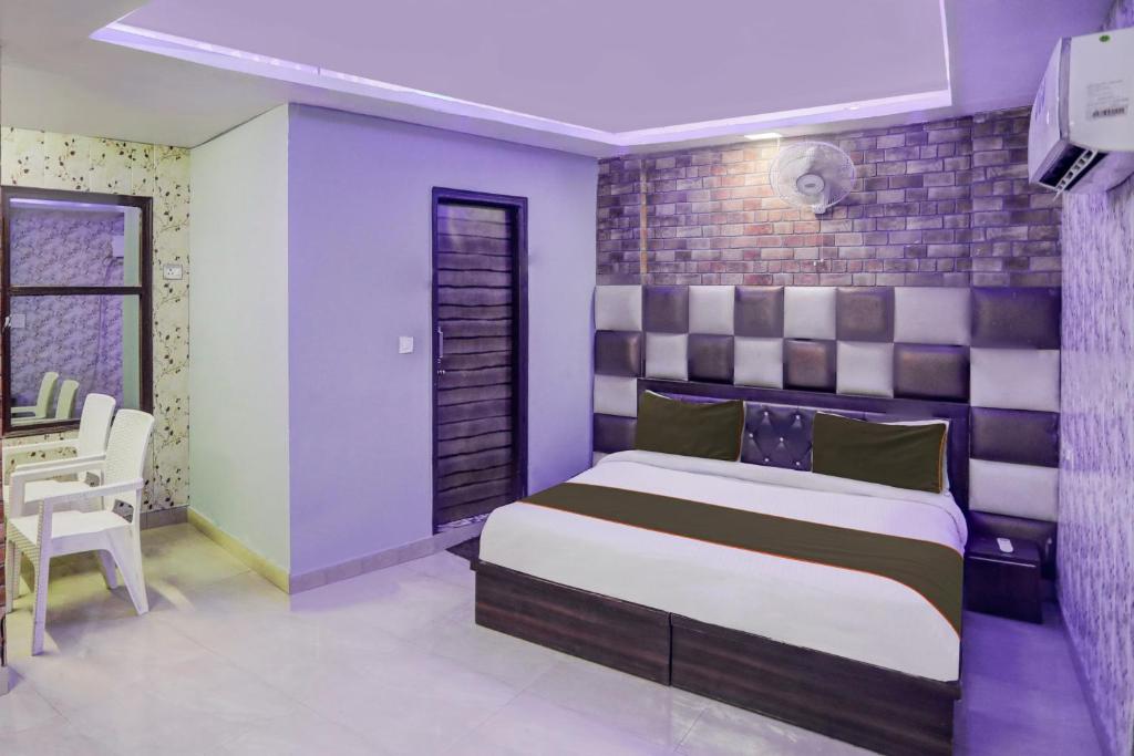 Postel nebo postele na pokoji v ubytování OYO 81208 HOTEL TERRENE EMPIRe