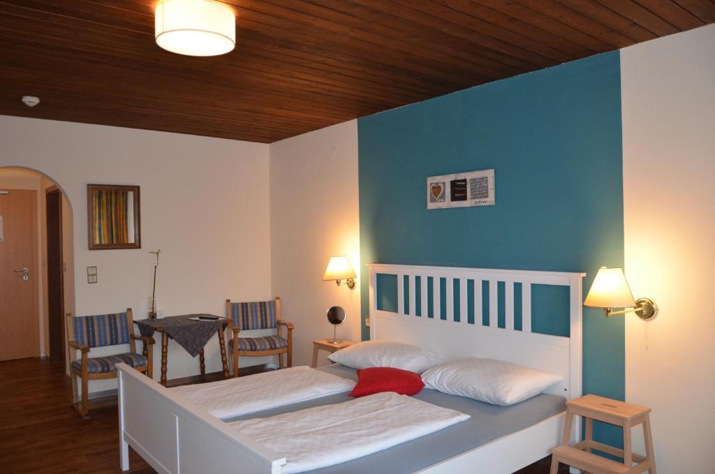 Posteľ alebo postele v izbe v ubytovaní Dahoam by Sarina - Rooms & Suites